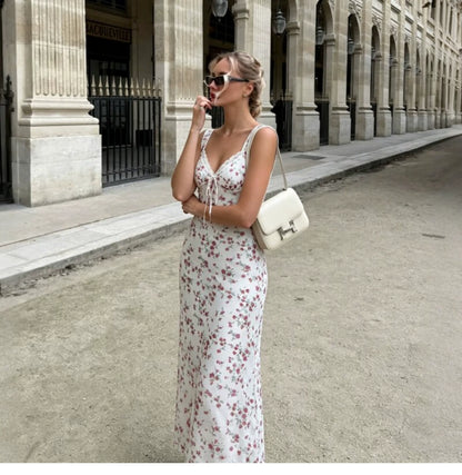 Holiday-style double-layer netted floral halter dress with lace stitching and tie straps, high-waisted and figure-hugging long dress